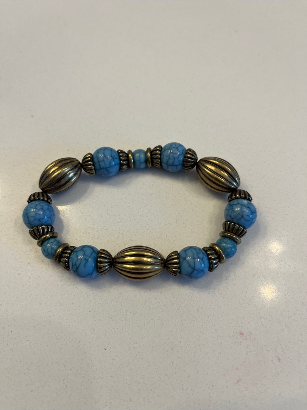 Turquoise Bead Stretch Bracelet with Antique Gold Accents